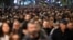 People take part in an opposition march in Belgrade on December 25. 
