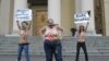 Акцыя кампаніі Femen насупраць беларускага КДБ 19 сьнежня 