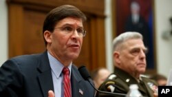 Secretary of Defense Mark Esper, left, and Chairman of the Joint Chiefs Gen. Mark Milley, testify to a House committee hearing on U.S. policy in Syria, Wednesday, Dec. 11, 2019, on Capitol Hill in Washington. (AP Photo/Jacquelyn Martin)