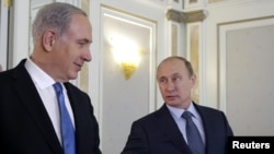 Прем’єр-міністр Ізраїлю Біньямін Нетаньягу (л) та президент Росії Володимир Путін, архівне фото