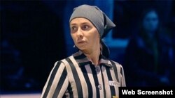 Tatyana Navka (above) and her skating partner, Andrei Burkovsky, wore the striped uniform of concentration camp victims with yellow Stars of David.