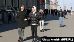 People on the streets of Minsk on March 23: Belarus looks like an island of inaction in the middle of a nervous -- in some cases overwhelmed -- European continent.