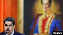 Венесуэла президенти Николас Мадуро матбуот анжуманида сўзламоқда. Каракас шаҳри, 2018, 25 январь.