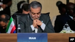 Iranian Foreign Minister Abbas Aragchi says that Tehran will "never bow" to pressure but adds that "diplomacy never dies." (file photo)