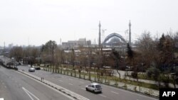 A photo shows an almost empty road in the Iranian capital Tehran, March 13, 2020