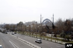A photo shows an almost emply road in Tehran on March 13.