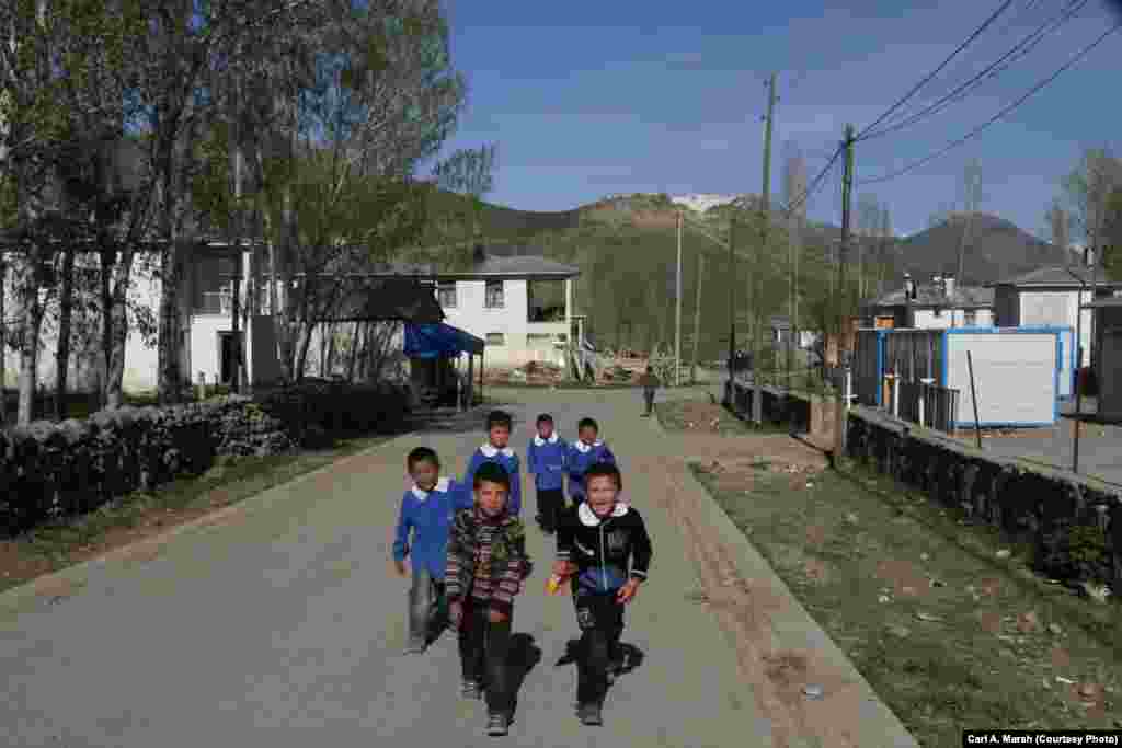 Children return home from school. The local schools don&#39;t offer a complete secondary education, and many children are sent away to boarding school after age 13.