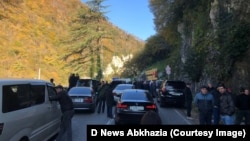 All the three access bridges into Abkhazia's capital, Sukhumi, and a highway were blocked by protesters demanding the release of detained activists.