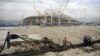 The construction of facilities for the 2014 Winter Olympics in Sochi, such as Olympic Stadium, has been dogged by huge cost overruns. (file photo)