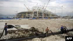 The construction of facilities for the 2014 Winter Olympics in Sochi, such as Olympic Stadium, has been dogged by huge cost overruns. (file photo)