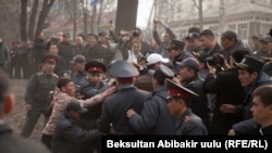 Sadyr Japarov supporters protest outside the state-security agency on March 25.