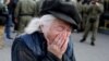 Belarus - An elderly woman reacts as she attends a rally to protest against the presidential election results in Minsk, 19sep2020