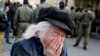 Belarus - An elderly woman reacts as she attends a rally to protest against the presidential election results in Minsk, 19sep2020