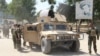 Afghan special forces gather at the battlefield amid clashes with the Taliban in Kunduz Province on June 22.