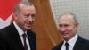 Russian President Vladimir Putin (right) meets with Turkish counterpart Recep Tayyip Erdogan in the Black Sea resort of Sochi on February 14.