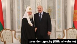Belarusian President Alyaksandr Lukashenka meets with the Patriarch Kirill in Minsk on October 15.