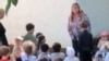 In the video, the kindergarten principal can be seen forcing a boy to kneel in front of her. 