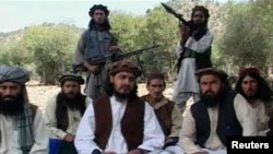 The Pakistani Taliban could have difficulties in deciding on a successor for former chief Hakimullah Mehsud (center) who was killed in a suspected drone strike earlier this month. 