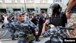 PHOTO GALLERY: Beatings, Arrests As Russians Protest Pension Reforms