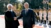 A handout picture provided by the Iranian presidency on November 17, 2018, shows Iran's President Hassan Rouhani next to Iraq's President Barham Salih (R) during a welcome ceremony in Tehran.