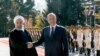 A handout picture provided by the Iranian presidency on November 17, 2018, shows Iran's President Hassan Rouhani next to Iraq's President Barham Salih (R) during a welcome ceremony in Tehran.