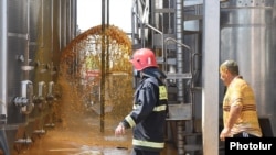 Armenia -- A firefighter and a worker at a brandy distillery in Armavir hit by a deadly explosion, September 1, 2020
