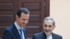 SYRIA -- Syrian President Bashar Assad (L) meets with Akbar Velayati, a top adviser to Iran's supreme leader, in Damascus, April 12, 2018