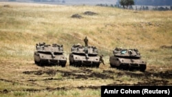 Israeli soldiers near the border with Syria in the Israeli-occupied Golan Heights on May 9