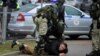 Police detain a man during an opposition march in Minsk in November 2020.