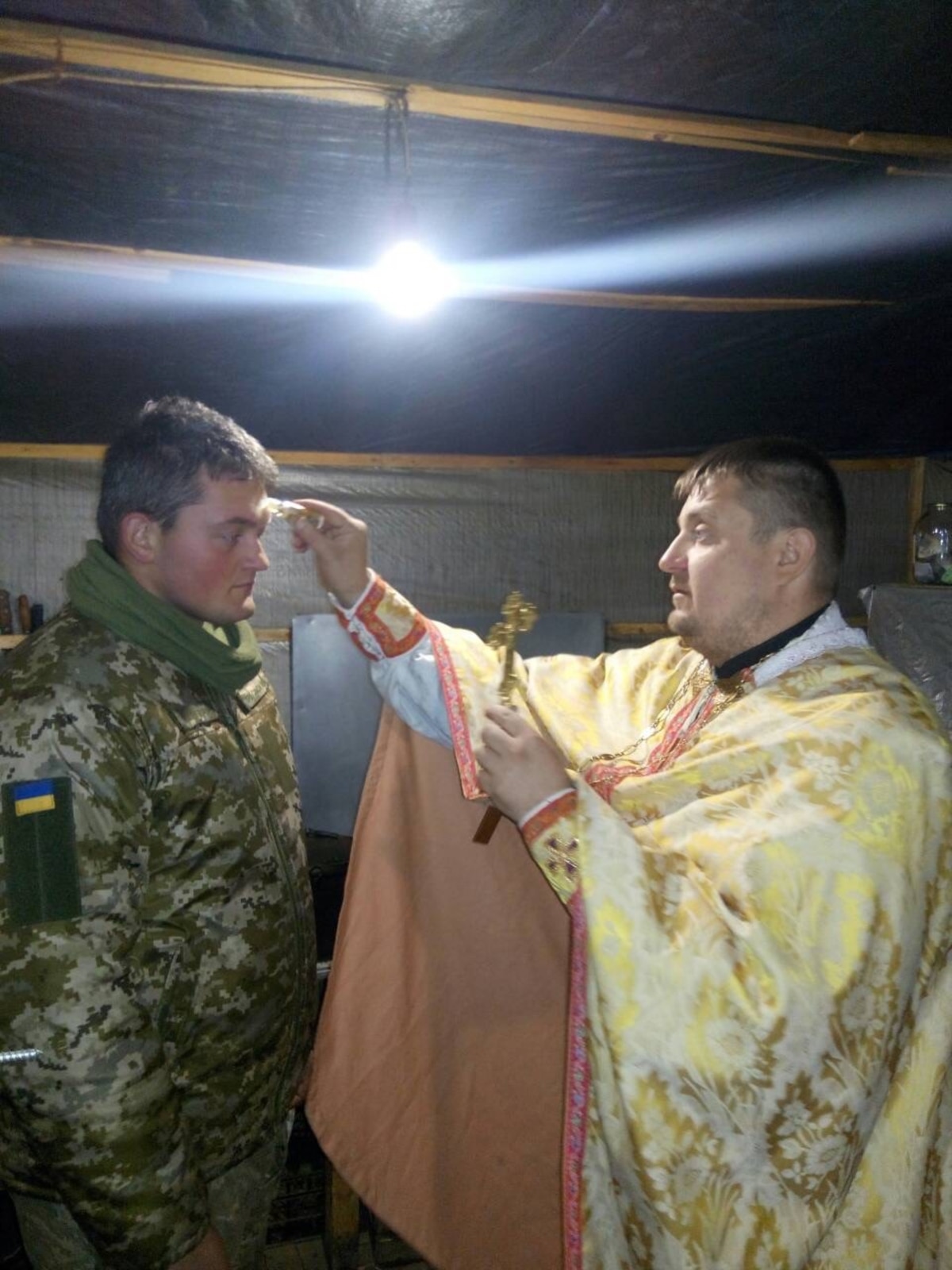 Orthodox Church of Ukraine military chaplain Father Maryan Senyk performs his spiritual service.
