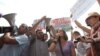 Armenia - Youth activists demonstrate outside the Yerevan municipality, 26Jul2013.