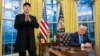 Elon Musk speaks as US President Donald Trump looks on in the Oval Office of the White House in Washington, DC, on February 11, 2025.