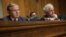 U.S. Senate Foreign Relations Committee Chairman Robert Menendez (left) and ranking member Bob Corker listen during a hearing before the committee on Capitol Hill in Washington last month.