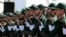 Islamic Revolutionary Guards Corps troops march during the annual military parade marking the start of Iran's 1980-88 war with Iraq in Tehran in September 2015.
