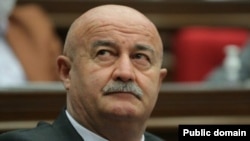 Armenia - Hovik Aghazarian of the ruling Civil Contract party attends a session of the Armenian parliament.