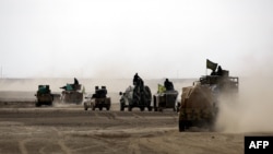 Syrian Democratic Forces advance near Raqqa last month.