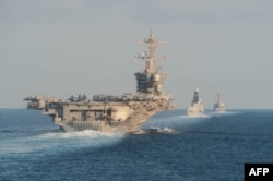 Авианосная ударная группа ВМС США во главе с "Abraham Lincoln", которая сейчас находится в северной части Аравийского моря и обеспечивает блокаду иранских портов. Морские мины представляют наибольшую опасность как раз для таких крупных и ограниченных в маневре кораблей