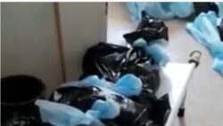 Ақсай ауруханасының мәйітінде түсірілген видеоның скриншоты.