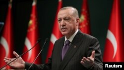 Turkey - Turkish President Tayyip Erdogan speaks during a news conference following a cabinet meeting in Ankara, December 14, 2020. 