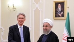 Hassan Rohani və Philip Hammond