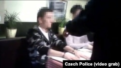 A screen grab from a video released by the Czech police showing the arrest of alleged Russian hacker Yevgeny Nikulin in Prague last month. 