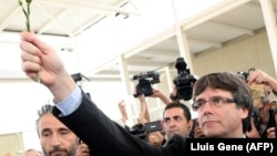 претседателот на Каталонија Карлес Пучдемон 