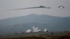 Nagorno-Karabakh - Armenian Mi-24 helicopters fire rockets during military exercises, 14Nov2014.