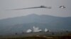 Nagorno-Karabakh - Armenian Mi-24 helicopters fire rockets during military exercises, 14Nov2014.