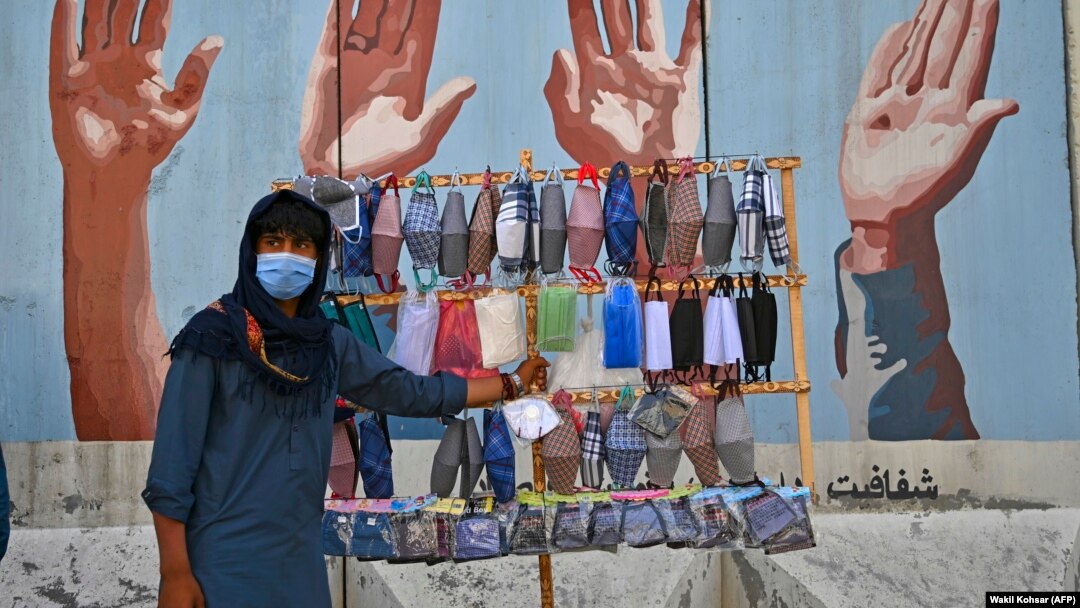 A street vendor sells face masks in Kabul.