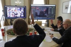 Mbajtja e mbledhjeve përmes aplikacionit Zoom, në kohën e koronavirusit.