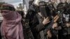 ISRAEL - Palestinian femal Islamic Jihad militants attend a protest against US President Donald J. Trump's decision to recognize Jerusalem as the capital of Israel, in Gaza City, Gaza Strip, 11 December 2017