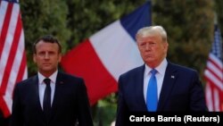 ترامپ و مکرون در مراسمی در ششم ژوئن سال جاری در فرانسه