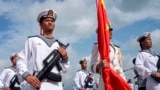 Chinese military sailors attend a welcome ceremony for a joint naval exercise with Russian forces in Zhanjiang, China, in July.