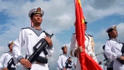 Chinese military sailors attend a welcome ceremony for a joint naval exercise with Russian forces in Zhanjiang, China, in July.